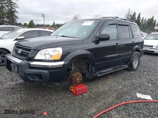 2004 Honda Pilot EX with VIN 2HKYF18674H585328, listed as a IAAI auction lot 41688735 with 214,194 mi miles. Bid and sale history available at carsss.com. Image 2.