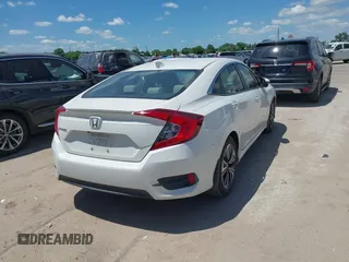2018 Honda Civic EX-T z VIN JHMFC1F3XJX001723, wystawiony jako IAAI lot #42228776 z przebiegiem 97 432 mil mil oraz . Historia ofert i sprzedaży dostępna na DreamBid. Obrazek 4.