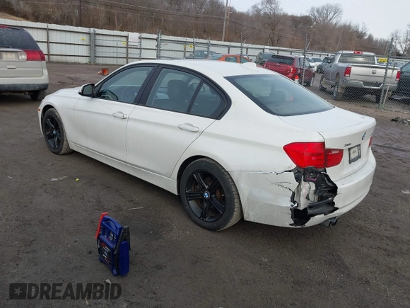 2013 BMW 3 Series 328i xDrive with VIN WBA3B5G5XDNS02162, listed as a IAAI auction lot 41484578 with 132,211 mi miles. Bid and sale history available at carsss.com. Image 3.
