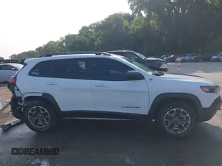 2021 Jeep Cherokee Trailhawk with VIN 1C4PJMBX4MD124980, listed as a IAAI auction lot 42372537 with 55,667 mi miles and . Bid and sale history available at DreamBid. Image 14.