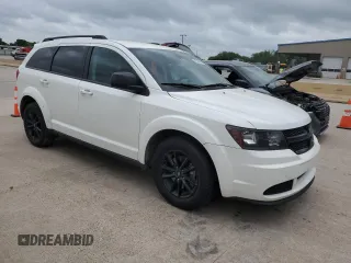 2020 Dodge Journey SE Value with VIN 3C4PDCAB3LT274708, listed as a Copart auction lot 54976285 with 132,283 mi miles and Clean Title. Bid and sale history available at carsss.com. Image 4.