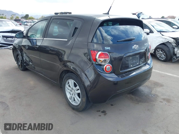 2014 Chevrolet Sonic LT with VIN 1G1JC6SHXE4135948, listed as a IAAI auction lot 41949833 with 127,202 mi miles. Bid and sale history available at carsss.com. Image 3.