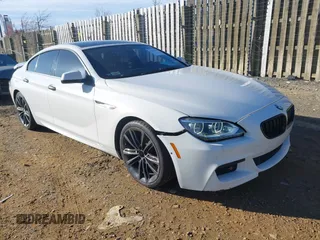 2015 BMW 6 Series 650i with VIN WBA6B2C54FGB99173, listed as a IAAI auction lot 41692594 with 123,664 mi miles and . Bid and sale history available at carsss.com. Image 1.