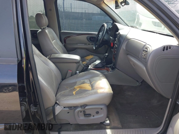 2002 Oldsmobile Bravada z VIN 1GHDT13S222469507, wystawiony jako IAAI lot #41787362 z przebiegiem Nie podano mil oraz . Historia ofert i sprzedaży dostępna na DreamBid. Obrazek 5.