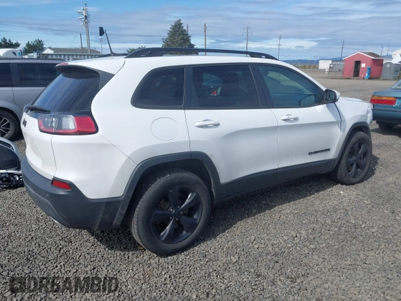 2019 Jeep Cherokee Latitude Plus with VIN 1C4PJMLX2KD432659, listed as a IAAI auction lot 42011291 with 76,015 mi miles. Bid and sale history available at carsss.com. Image 4.