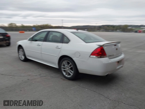 2013 Chevrolet Impala LTZ with VIN 2G1WC5E37D1223897, listed as a IAAI auction lot 41950823 with 165,237 mi miles and . Bid and sale history available at DreamBid. Image 3.