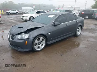 2009 Pontiac G8 GT z VIN 6G2EC57Y19L203150, wystawiony jako IAAI lot #42314747 z przebiegiem 130 188 mil mil oraz . Historia ofert i sprzedaży dostępna na DreamBid. Obrazek 2.