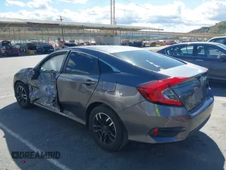 2016 Honda Civic Sedan LX with VIN 19XFC2F51GE034644, listed as a IAAI auction lot 41939884 with 59,433 mi miles. Bid and sale history available at carsss.com. Image 3.