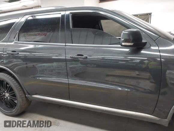 2011 Dodge Durango Crew with VIN 1D4RD4GG2BC729899, listed as a IAAI auction lot 41414720 with 209,281 mi miles and . Bid and sale history available at DreamBid. Image 13.
