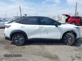 2023 Nissan ARIYA Evolve+ z VIN JN1DF0BB5PM709737, wystawiony jako IAAI lot #42287939 z przebiegiem 5982 mil mil oraz . Historia ofert i sprzedaży dostępna na DreamBid. Obrazek 14.