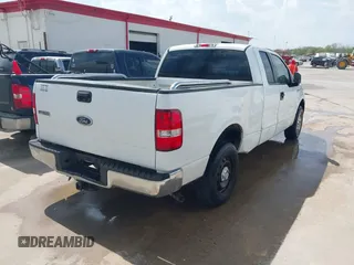 2005 Ford F-150 STX with VIN 1FTRX12W85NB75651, listed as a IAAI auction lot 41789580 with 235,133 mi miles. Bid and sale history available at carsss.com. Image 4.