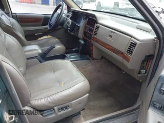 1993 Jeep Grand Cherokee Limited z VIN 1J4GZ78Y7PC531299, wystawiony jako IAAI lot #42117795 z przebiegiem 168 995 mil mil oraz . Historia ofert i sprzedaży dostępna na DreamBid. Obrazek 5.