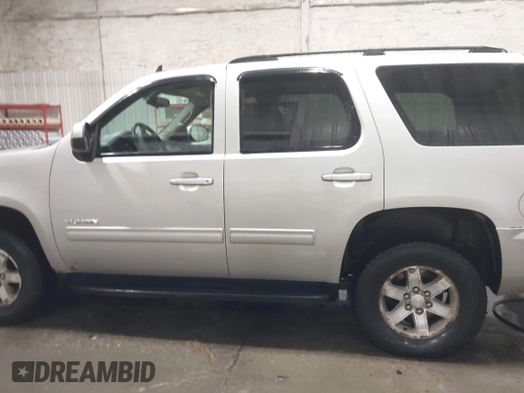2011 GMC Yukon SLE with VIN 1GKS2AE01BR233860, listed as a IAAI auction lot 41838392 with 226,611 mi miles. Bid and sale history available at carsss.com. Image 14.