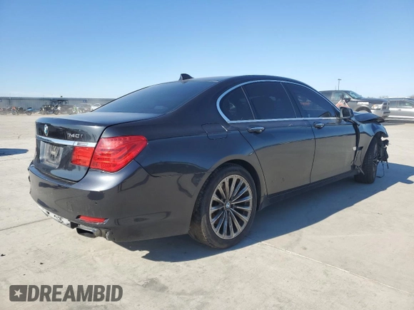 2011 BMW 7 Series 740i with VIN WBAKA4C57BC612487, listed as a Copart auction lot 82633554 with 0 mi miles and Salvage Title. Bid and sale history available at carsss.com. Image 3.