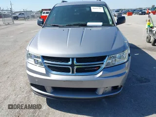 2018 Dodge Journey SE z VIN 3C4PDCAB8JT344720, wystawiony jako IAAI lot #40491703 z przebiegiem 86 601 mil mil oraz . Historia ofert i sprzedaży dostępna na DreamBid. Obrazek 12.