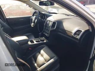 2011 Jeep Grand Cherokee Laredo with VIN 1J4RR4GG4BC703071, listed as a IAAI auction lot 41992878 with 126,199 mi miles and . Bid and sale history available at DreamBid. Image 5.