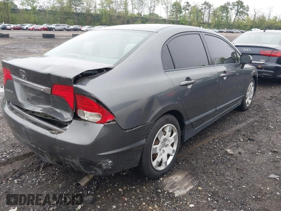 2010 Honda Civic LX with VIN 2HGFA1F59AH326233, listed as a IAAI auction lot 42190935 with 61,378 mi miles and . Bid and sale history available at DreamBid. Image 4.