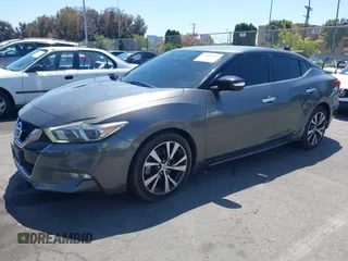 2018 Nissan Maxima Platinum z VIN 1N4AA6AP1JC388815, wystawiony jako IAAI lot #42098902 z przebiegiem 80 677 mil mil oraz . Historia ofert i sprzedaży dostępna na DreamBid. Obrazek 2.