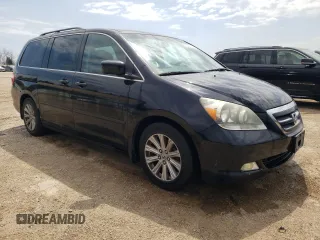 2007 Honda Odyssey Touring with VIN 5FNRL38847B022928, listed as a Copart auction lot 53869135 with 217,620 mi miles and Salvage Title. Bid and sale history available at DreamBid. Image 4.