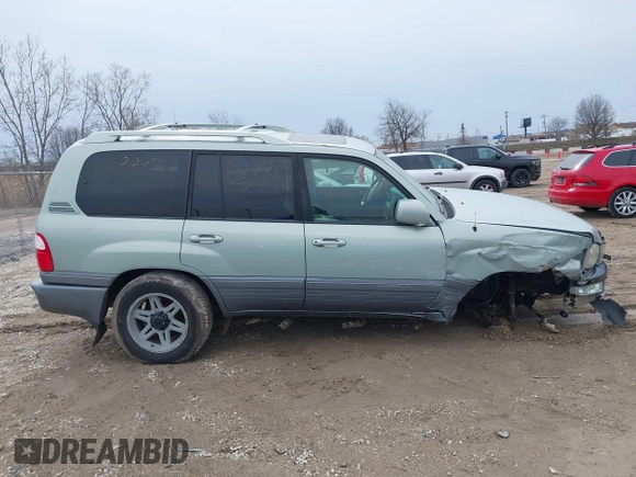 2004 Lexus LX 470 z VIN JTJHT00W143546192, wystawiony jako IAAI lot #41673810 z przebiegiem 232 196 mil mil oraz . Historia ofert i sprzedaży dostępna na DreamBid. Obrazek 13.