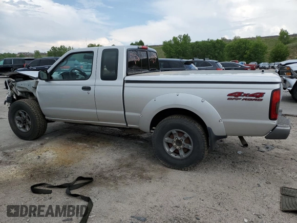 2004 Nissan Frontier XE Desert Runner with VIN 1N6ED26Y44C402138, listed as a Copart auction lot 58828425 with 125,143 mi miles and Salvage title. Bid and sale history available at DreamBid. Image 2.