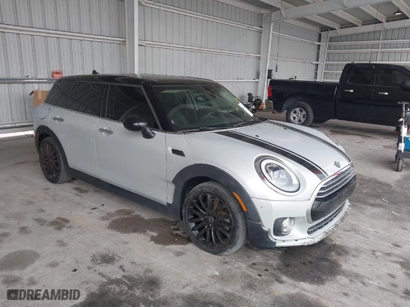 2019 MINI Cooper Clubman with VIN WMWLN5C53K2E34830, listed as a IAAI auction lot 41419983 with 64,716 mi miles. Bid and sale history available at carsss.com. Image 1.