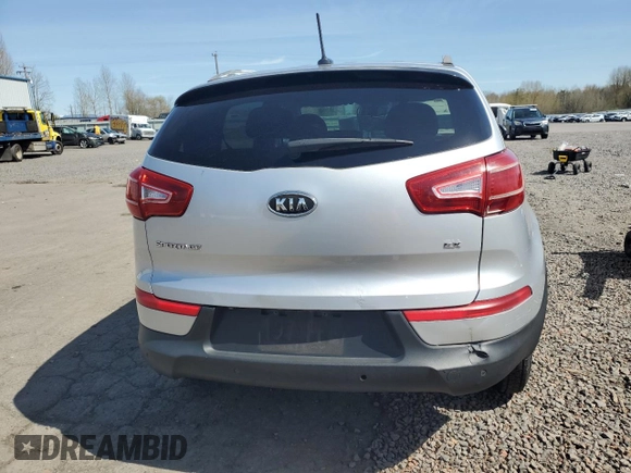 2012 Kia Sportage EX z VIN KNDPCCA26C7176313, wystawiony jako Copart lot #51994005 z przebiegiem 167 759 mil mil oraz Szkoda całkowita • Salvage title. Historia ofert i sprzedaży dostępna na DreamBid. Obrazek 6.