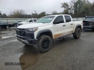 2023 Chevrolet Colorado 4WD Trail Boss with VIN 1GCPTEEK5P1255504, listed as a Copart auction lot 87727235 with 23,817 mi miles and Salvage Title. Bid and sale history available at carsss.com. Image 1.