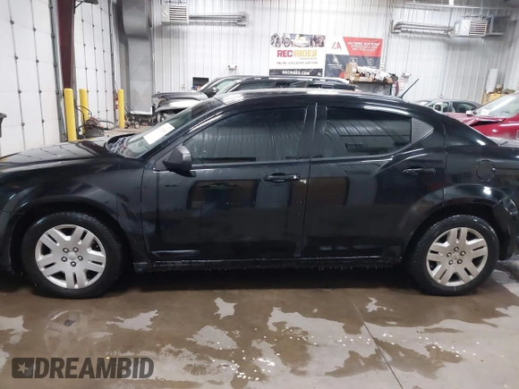 2012 Dodge Avenger SE with VIN 1C3CDZAB7CN115308, listed as a IAAI auction lot 41332696 with 84,006 mi miles and . Bid and sale history available at DreamBid. Image 14.