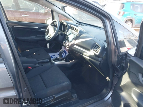 2015 Honda Fit EX-L with VIN 3HGGK5H85FM755006, listed as a IAAI auction lot 41034606 with 97,294 mi miles and . Bid and sale history available at DreamBid. Image 5.