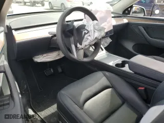 2023 Tesla Model Y Long Range with VIN 7SAYGDEE3PF693316, listed as a Copart auction lot 49501945 with 0 mi miles and Salvage Title. Bid and sale history available at carsss.com. Image 8.
