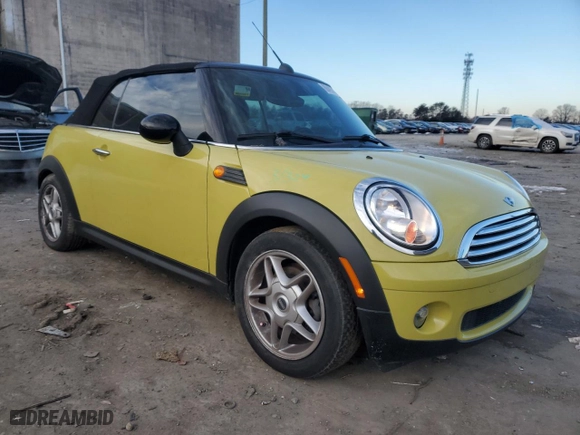 2009 MINI Cooper Convertible with VIN WMWMR33549TU95327, listed as a Copart auction lot 88493115 with 76,714 mi miles and Salvage Title. Bid and sale history available at carsss.com. Image 4.