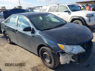 2012 Toyota Camry L with VIN 4T4BF1FKXCR212957, listed as a IAAI auction lot 41672878 with 245,407 mi miles. Bid and sale history available at carsss.com. Image 1.