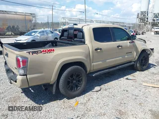2020 Toyota Tacoma SR5 z VIN 3TMCZ5AN1LM300447, wystawiony jako IAAI lot #41961434 z przebiegiem 42 090 mil mil oraz . Historia ofert i sprzedaży dostępna na DreamBid. Obrazek 4.
