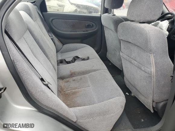 2003 Kia Spectra with VIN KNAFB121835244872, listed as a Copart auction lot 71520674 with 0 mi miles and Salvage Title. Bid and sale history available at carsss.com. Image 10.