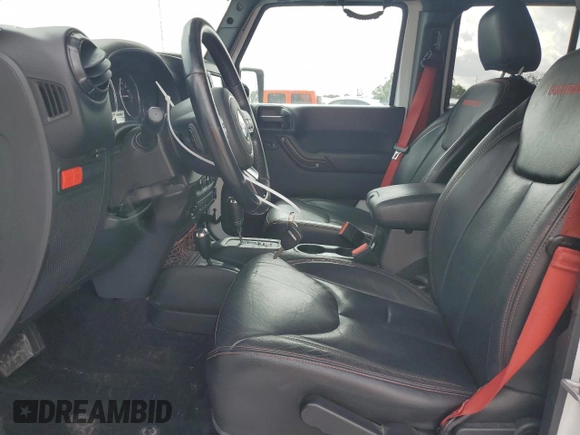 2017 Jeep Wrangler Unlimited Rubicon z VIN 1C4HJWFG6HL692928, wystawiony jako Copart lot #60049775 z przebiegiem 145 033 mil mil oraz Nie do naprawy • Non repairable. Historia ofert i sprzedaży dostępna na DreamBid. Obrazek 7.