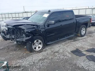 2017 Chevrolet Silverado 1500 LT with VIN 3GCUKREC9HG374973, listed as a IAAI auction lot 41423560 with 141,661 mi miles. Bid and sale history available at carsss.com. Image 2.