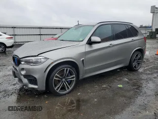 2016 BMW X5 M with VIN 5YMKT6C56G0R77641, listed as a Copart auction lot 43276205 with 86,910 mi miles and Salvage Title. Bid and sale history available at carsss.com. Image 1.