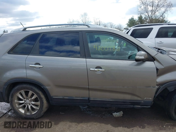 2011 Kia Sorento EX with VIN 5XYKUDA26BG123044, listed as a IAAI auction lot 42007811 with 193,657 mi miles. Bid and sale history available at carsss.com. Image 14.