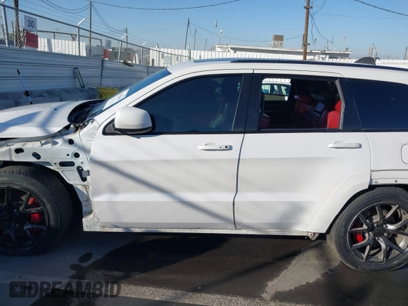 2017 Jeep Grand Cherokee SRT with VIN 1C4RJFDJ7HC600227, listed as a IAAI auction lot 41390600 with 96,841 mi miles. Bid and sale history available at carsss.com. Image 15.