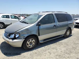 1998 Toyota Sienna LE with VIN 4T3ZF13C4WU064791, listed as a Copart auction lot 61411865 with 218,835 mi miles and Salvage title. Bid and sale history available at DreamBid. Image 1.