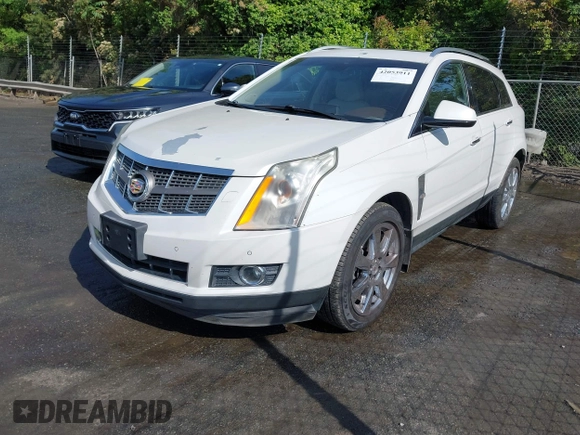2012 Cadillac SRX Performance Collection с VIN 3GYFNBE30CS599466, выставлен на аукционе IAAI как лот 42053911 с пробегом 167 242 миль миль и . История ставок и продаж доступна на DreamBid. Изображение 17.