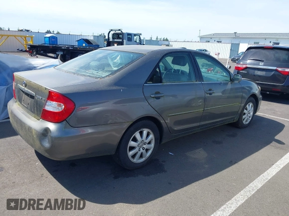 2003 Toyota Camry LE with VIN 4T1BE32K03U754857, listed as a IAAI auction lot 42224229 with Not Provided miles and . Bid and sale history available at DreamBid. Image 4.