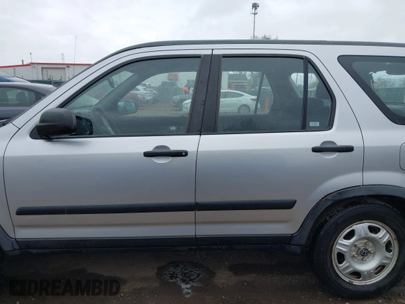 2006 Honda CR-V LX with VIN JHLRD78536C035954, listed as a IAAI auction lot 42043220 with 250,337 mi miles and . Bid and sale history available at carsss.com. Image 13.