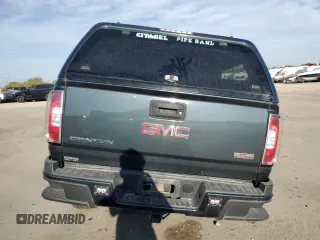 2017 GMC Canyon z VIN 1GTP6CE1XH1252005, wystawiony jako Copart lot #74982794 z przebiegiem 62 797 mil mil oraz Szkoda całkowita • Salvage title. Historia ofert i sprzedaży dostępna na DreamBid. Obrazek 6.
