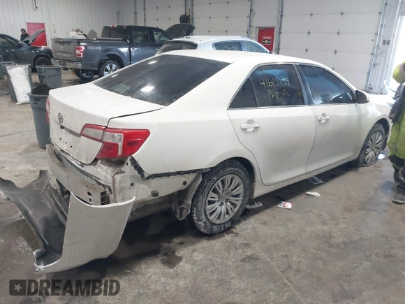 2014 Toyota Camry L with VIN 4T1BF1FK4EU763009, listed as a IAAI auction lot 41615134 with 165,293 mi miles and . Bid and sale history available at carsss.com. Image 4.