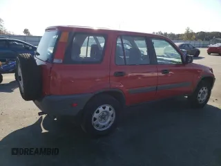 2000 Honda CR-V LX with VIN JHLRD1843YC063597, listed as a Copart auction lot 77765884 with 310,685 mi miles and Salvage Title. Bid and sale history available at carsss.com. Image 3.