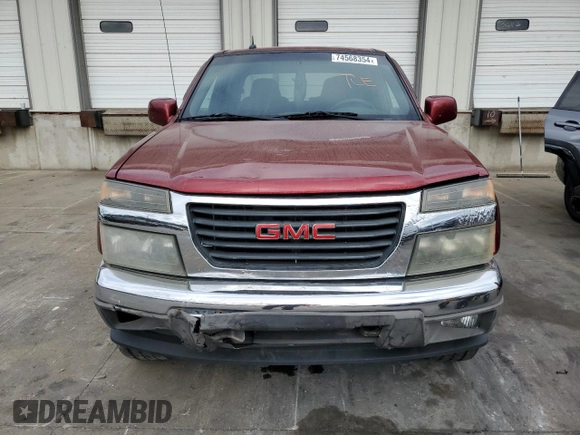 2010 GMC Canyon SLE1 with VIN 1GTJTCDP1A8136659, listed as a Copart auction lot 74568354 with 243,634 mi miles and Salvage Title. Bid and sale history available at carsss.com. Image 5.