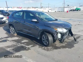 2018 Honda HR-V LX with VIN 3CZRU6H35JG719653, listed as a IAAI auction lot 41956051 with 74,307 mi miles. Bid and sale history available at carsss.com. Image 1.