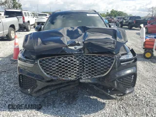 2025 Genesis GV70 Sport with VIN 5NMMCDTC0SH031404, listed as a Copart auction lot 56871775 with 1,687 mi miles and Salvage title. Bid and sale history available at DreamBid. Image 5.